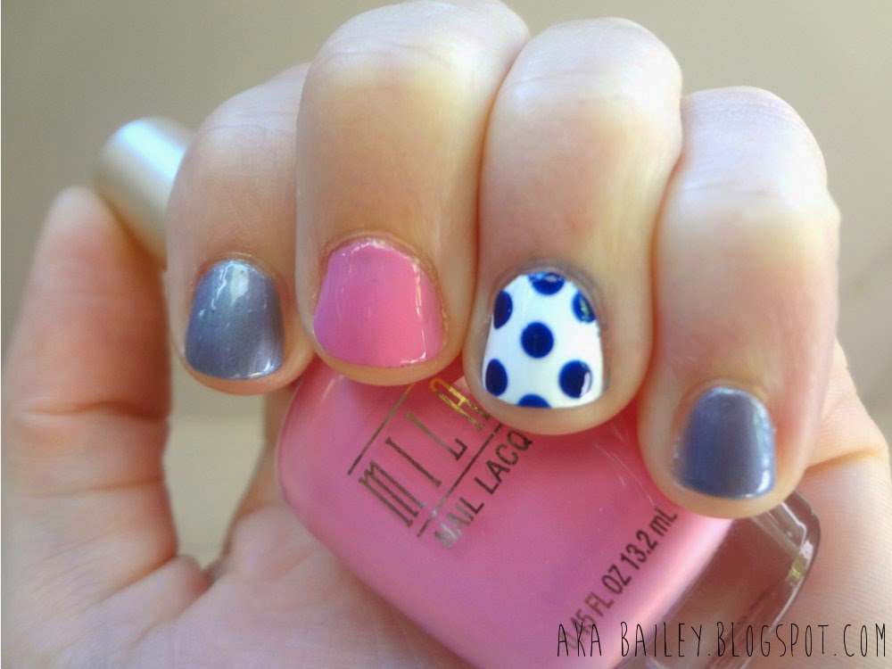 Blue and pink nails with polka dot accent nail