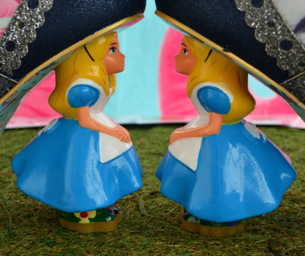 Irregular Choice Alice Lost Your Muchness boots character heels facing Disney Alice character heels facing each other