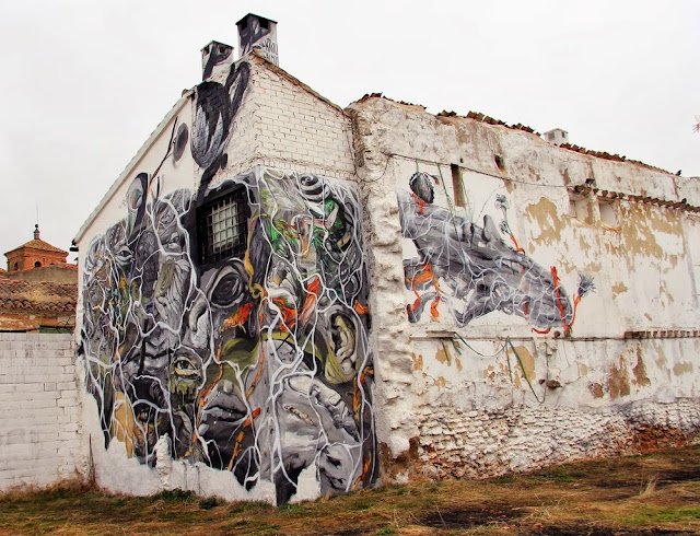 "And Do Not Come Back" New Street Art Mural by Spanish artist Laguna somewhere on the streets of Alamagro in Spain. 2