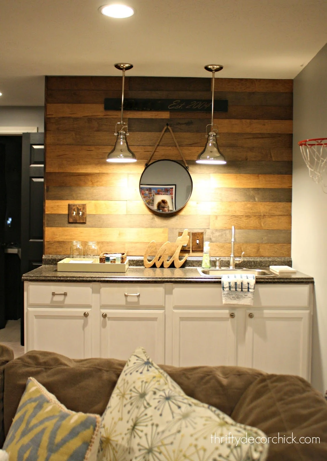 wood planked wall over kitchenette