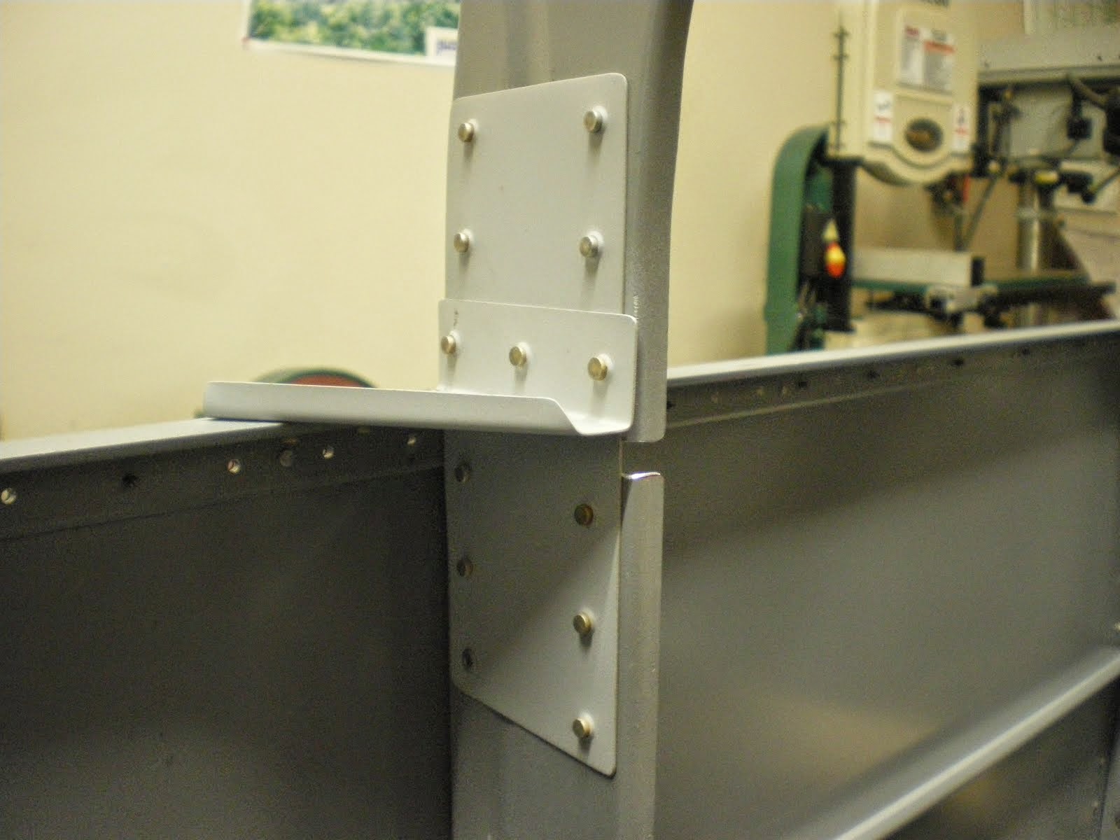 Splice plate and stiffener bracket riveted in place