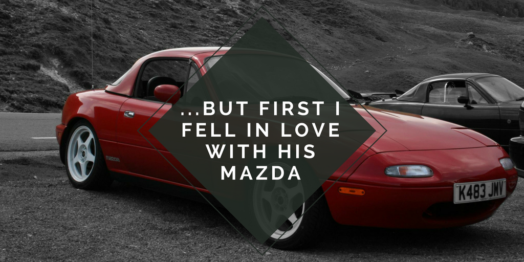 an mx5 sports car in the background with the blog title within a triangle.