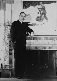 Robert Ormond Case, western author, in front of a painting for his serial, Wings North, that appeared in the Saturday Evening Post in 1938