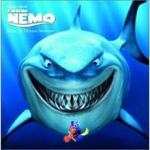 grinning shark from DVD cover of Finding Nemo animatedfilmreviews.blogspot.com
