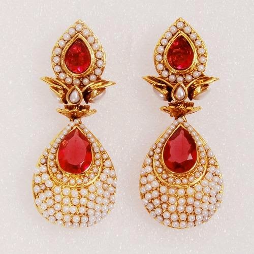 gold gemstone earrings the red
