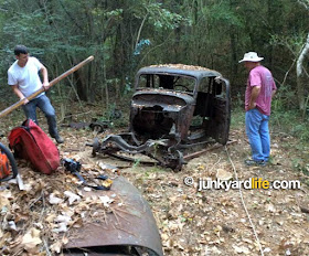 Jody Potter and Ron Kidd steered the 1934 Ford while the Jeep and Keith pulled using a winch.