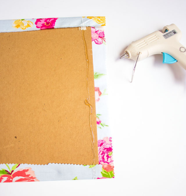 Such a fun thrift store makeover! Transform an old picture frame into this colorful Hello Spring fabric art! Such a fun thrift store makeover! Transform an old picture frame into this colorful Hello Spring fabric art!