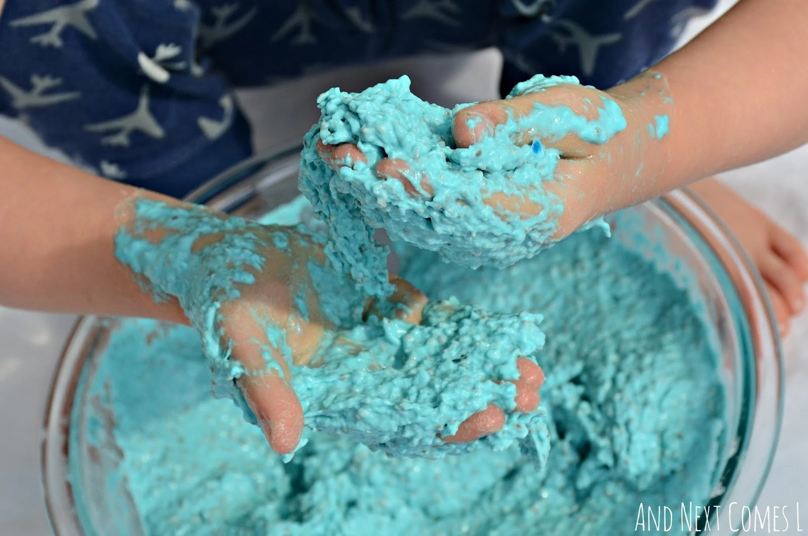 Edible sludge sensory play from And Next Comes L