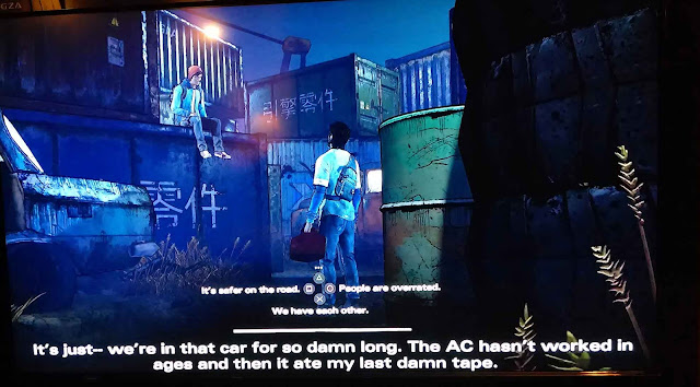 Telltale games Walking Dead screen shot. Image of two people, large subtitles and tiny dialogue text options, rendering the game inaccessible for many.