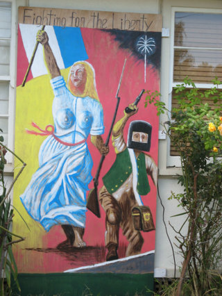 「市民を誘導する自由の女神」:  <br>我が玄関前の壁画