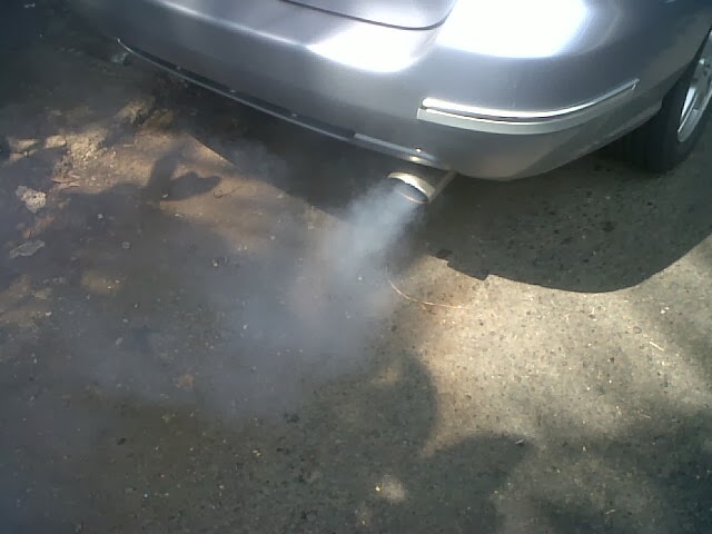 White smoke out of car
