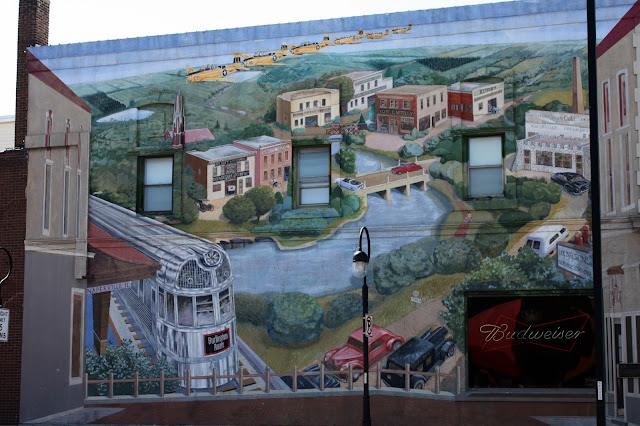 A City in Transit mural in Naperville