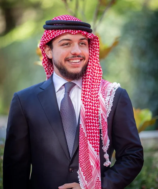 King Abdullah, Queen Rania, Crown Prince Al Hussein, Princess Salma, Prince Hashem attend a ceremony held in Amman for kingdom's 70th Independence Day. Queen Rania dress style, fashions, Valentino dress, Gant dress