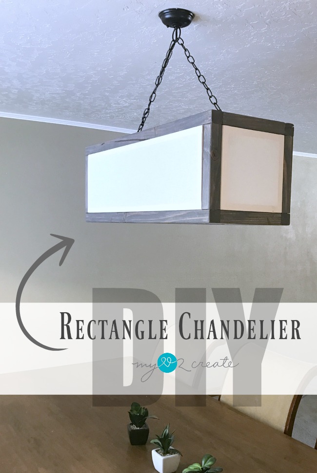 Build your own Rectangle Chandelier with linen inset shades to get that high end look for less. Free plans and tutorial at MyLove2Create!