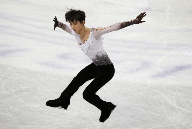 Yuzuru Hanyu (JPN) udfører sit lange program ved VM 2014 i kunstskøjteløb