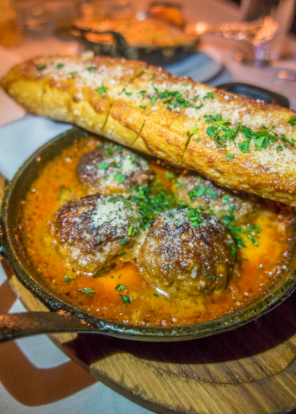 Prime Beef Meatballs with cheese curds and garlic bread at Maple & Ash in Chicago Prime Beef Meatballs with cheese curds and garlic bread at Maple & Ash in Chicago