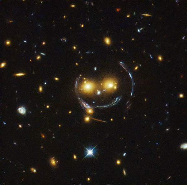 Hubble telescope discovers giant smile in space.