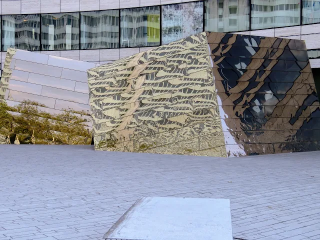 Düsseldorf things to do: Check out the mirrored sculpture behind Dreischeibenhaus