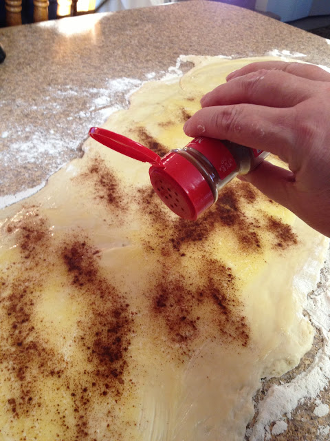 sprinkle 1 cup of sugar over the cinnamon and butter