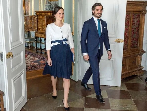 Princess Sofia Hellqvist of Sweden wore Seraphine maternity Dress and Coat