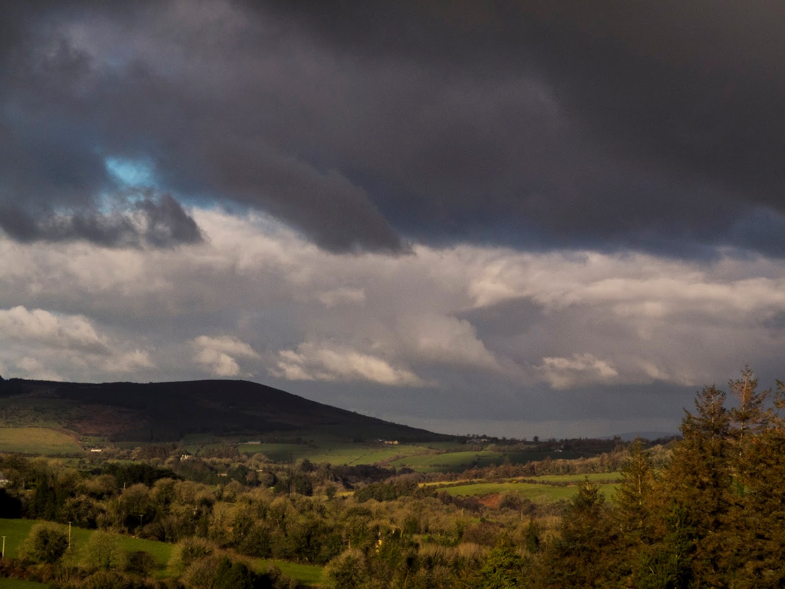 Dark sky Dark clouds over the Boggeragh Mountain valley.