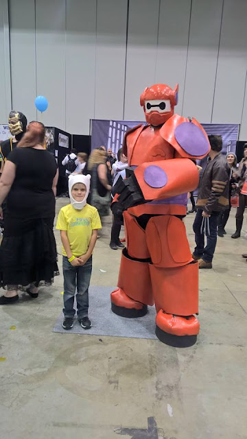 Corbin, dressed up in costume, with a character at Comic-Con