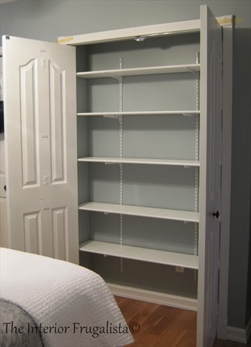 Installing adjustable shelving and bi-fold doors on DIY folded clothing storage closet.