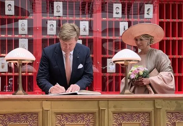 Brandenburg's Prime Minister Dietmar Woidke and his wife Susanne Woidke. Queen mMaxima wore Natan dress