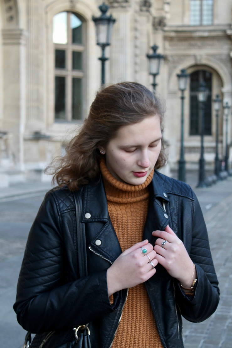 Parisian leather jacket, camel turtleneck and Vans shoes