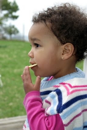 NAMC montessori community year end activities family picnic girl eating