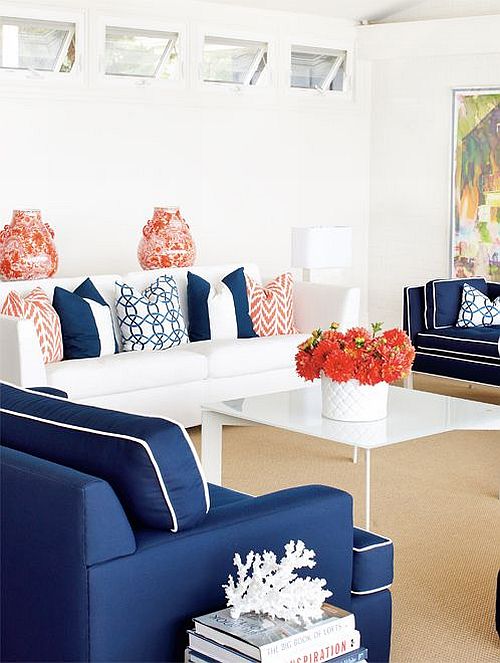 amazing white, coral and navy living room