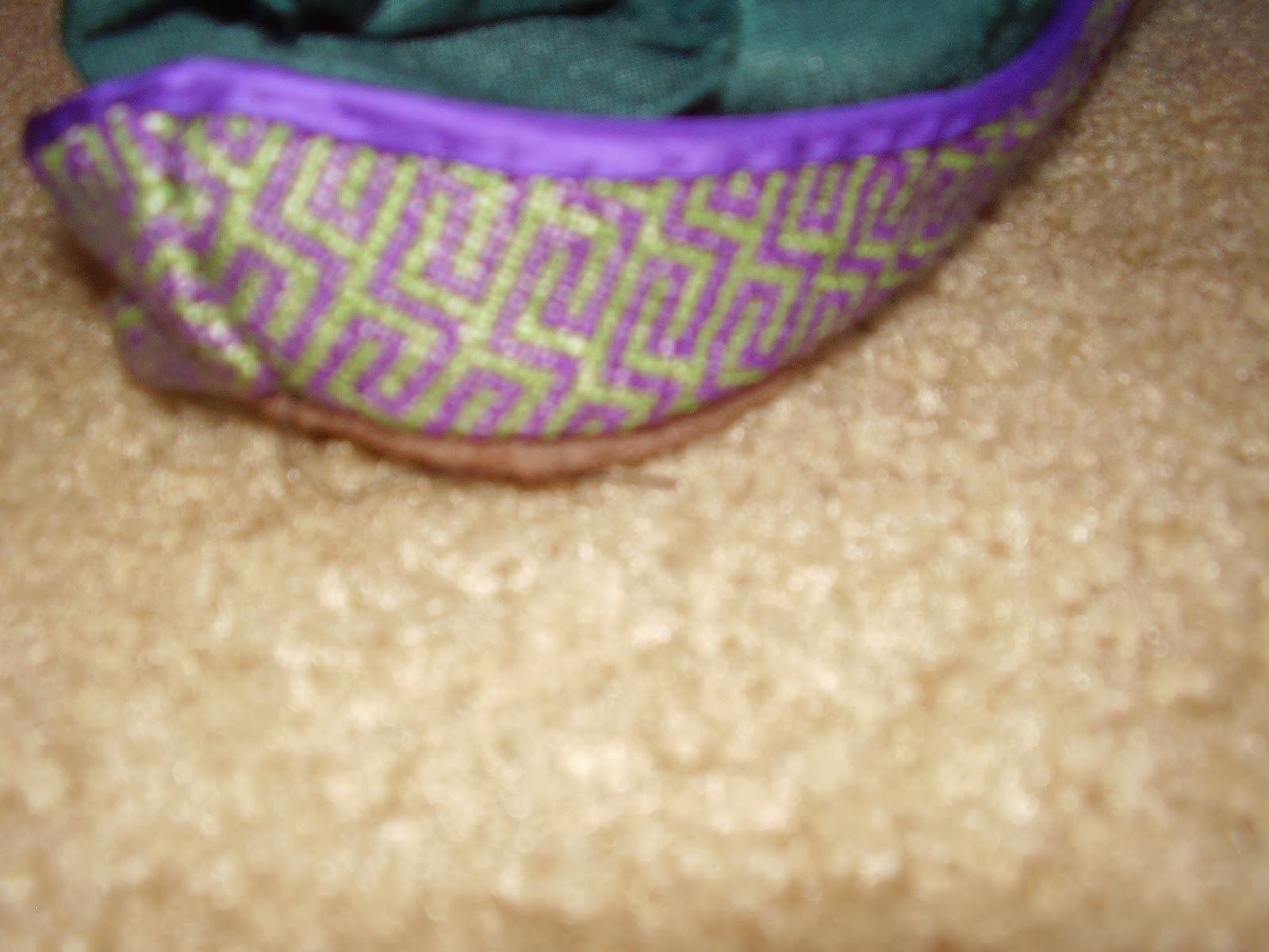Heel of Berlin-work slipper with Greek key design. Heel of Berlin-work slipper with Greek key design.