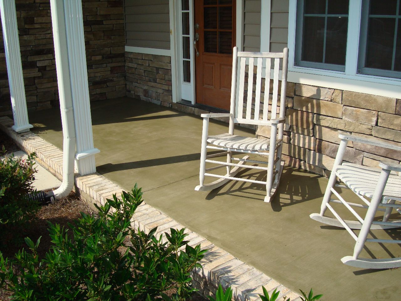 Atlantic Coast Concrete Stained Porch and Stamped Patio in French Grey