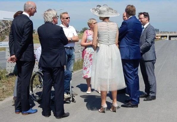 King Willem-Alexander of The Netherlands and Queen Máxima of The Netherlands visited West Friesland region. Natan dress