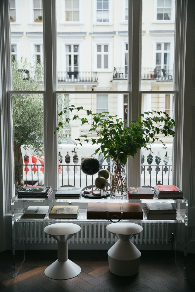 Window overlooking city in guest room at The Laslett Hotel in Notting Hill in the heart of West London