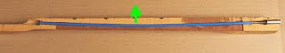 image of guitar truss rod embedded in guitar neck