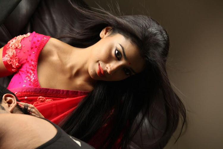 Shriya Saran in red hot Saree Stills for Pavithra Movie