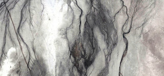 fantasy witch hairs,composition,abstract landscapes of deserts,Abstract Naturalism,abstract photography deserts of Africa from the air,abstract surrealism,mirage in Sahara ,fantasy forms of water land from the air, stone art, black lines, munimara photos, fantasy forms of stone and colors in the desert, aerial, valley, surreal, composition, art, land, abstract surrealism, gray background,