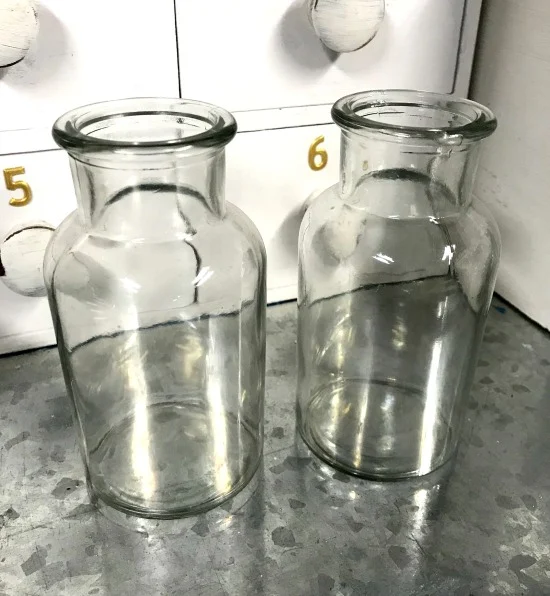 Glass bottles used to make terrarium planters