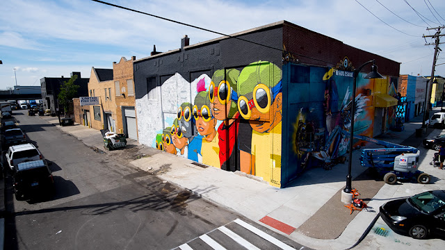 Chicago's Hebru Brantley has had a busy summer and just finished this piece for "Murals In The Market". In Detroit's Eastern Market neighborhood, this massive work is 60x28 and on the corner of Adelade and Russell.