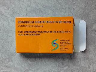 Front side of orange box containing six 85mg Potassium Iodate tablets in blister pack.
