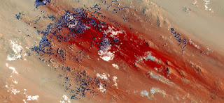 bloodstains on the wall of shame from the hands of a woman stoned to death by the barbarians always, pictures from the air from the deserts of Africa, Abstract Naturalism collection of Munimara pictures from the air from the deserts of Africa,Abstract Naturalism collection of Munimara