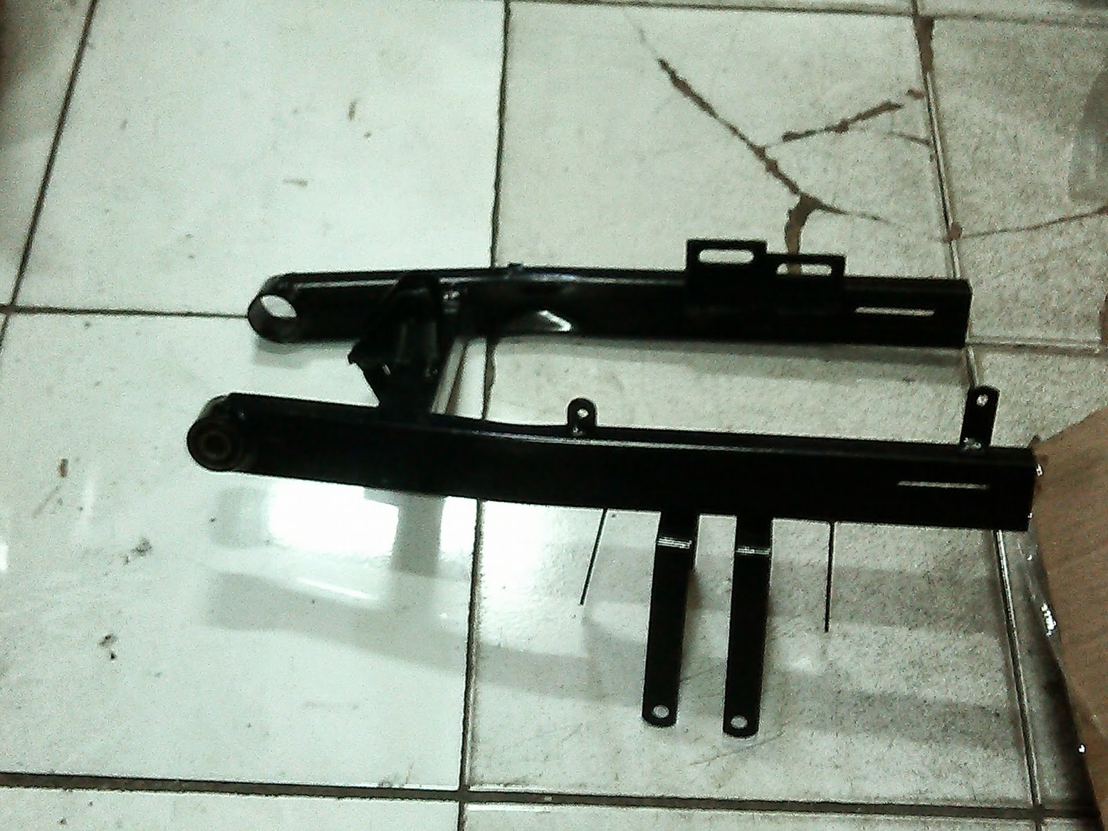 limbah motor trail swing arm mini trail