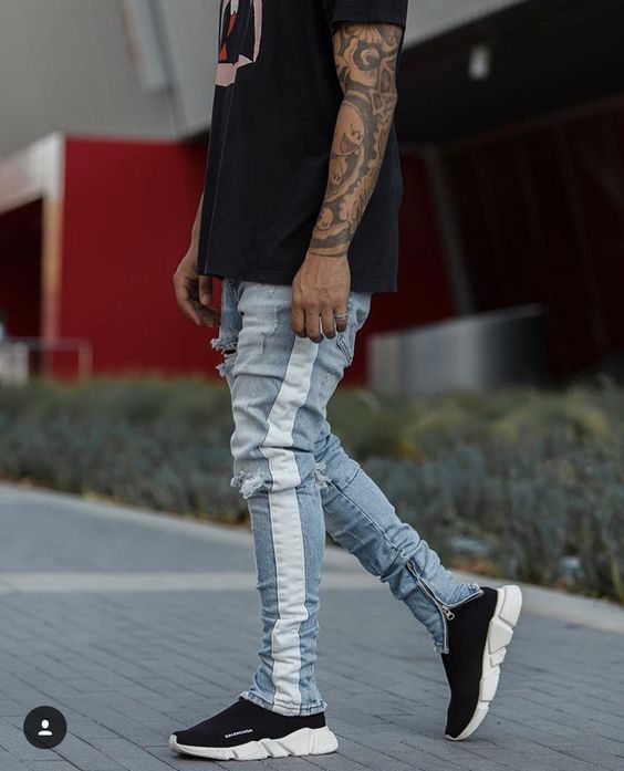 calça jeans preta com listra lateral