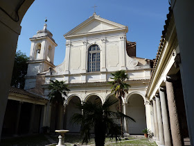 The garden and facade of the Basilica of San Clemente 