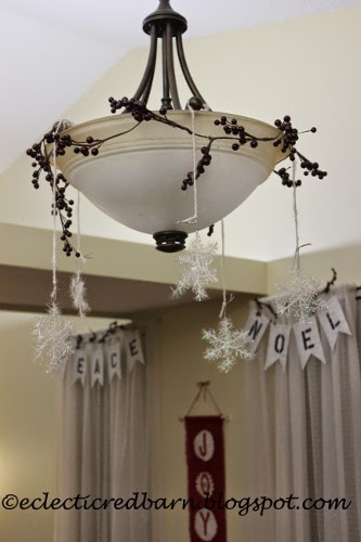 Eclectic Red Barn: Dining room light with berries and snowflakes