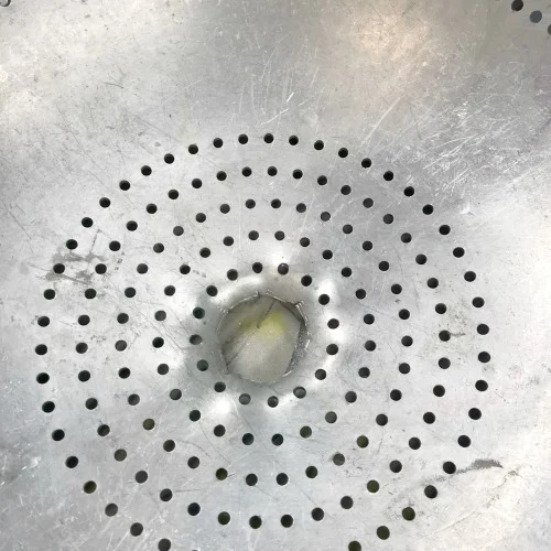 Hole in top of colander