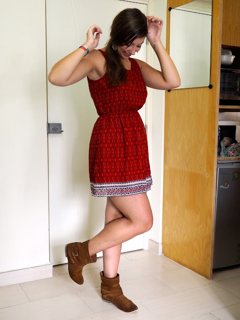 Feel the Sunshine | outfit of a short red patterned summer dress with cut out back, worn with brown ankle boots