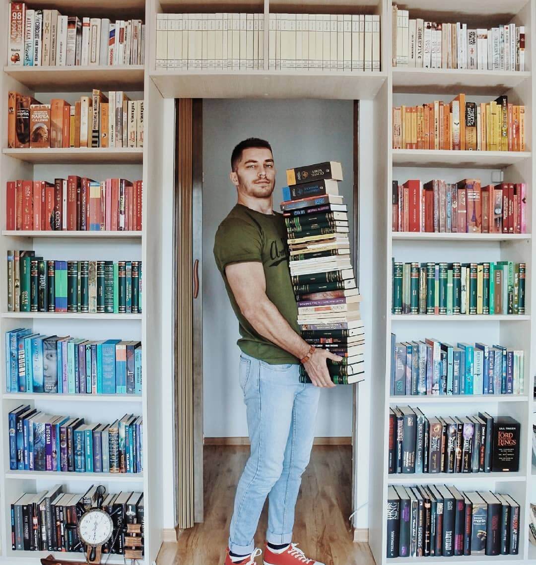 Guy Creatively Arranges His Huge Library of Books Into Artistic Scenes Guy Creatively Arranges His Huge Library of Books Into Artistic Scenes