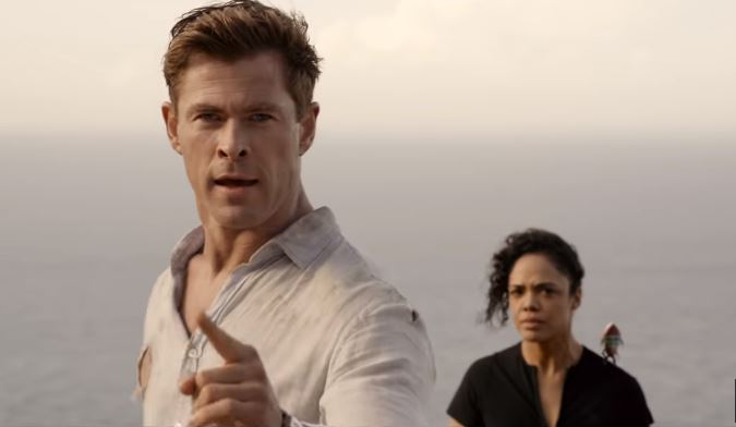 Men in Black International 2019 sci-fi action comedy movie featuring Agent M played by Tessa Thompson and Agent H played by Chris Hemsworth